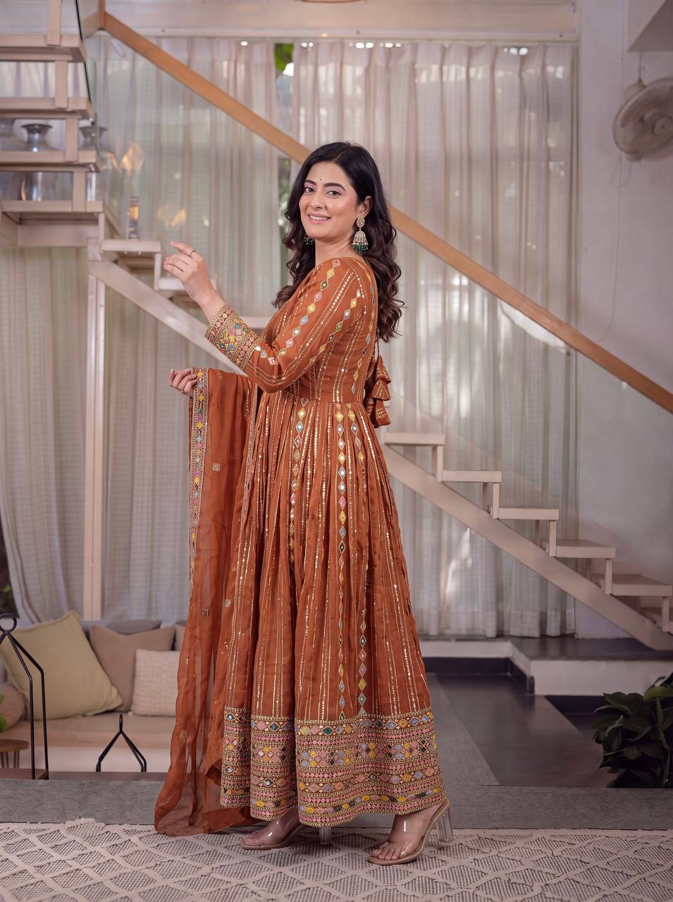 Radiant Rust Orange Flared Anarkali Suit Set Adorned with Multicolored Geometric Embroidery and Dazzling Mirror Work Detailing